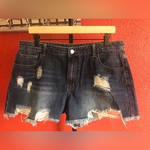 Unknown brand. Size XL. Dark blue denim.